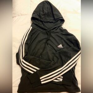 Woman’s cropped Adidas hoodie